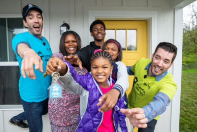 new homeowners receiving house keys
